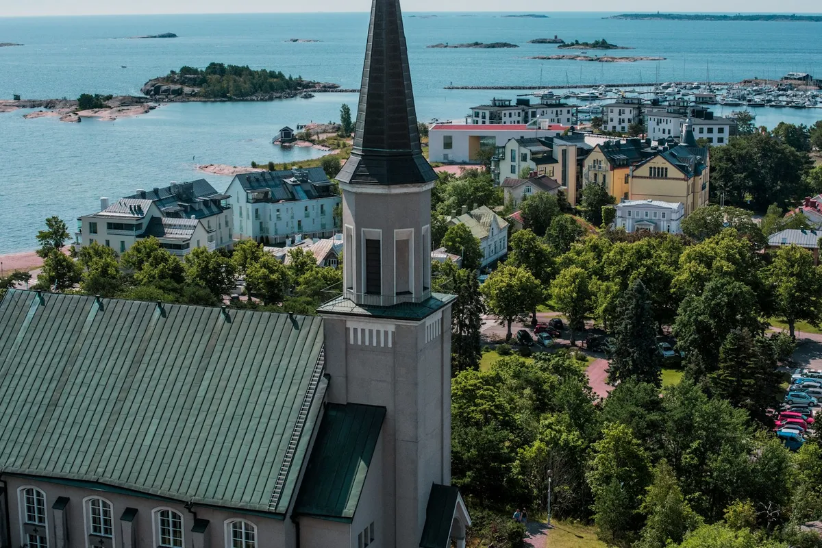 Hanko Church from above, with villas, the marina and the archipelago behind