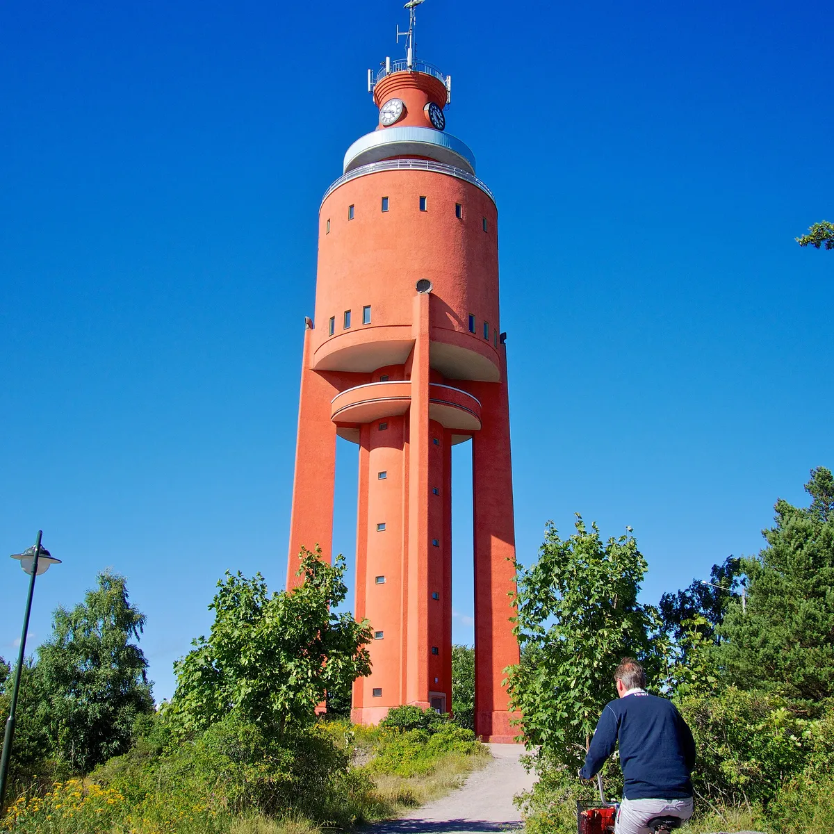 The red Hanko water tower against a blue sky